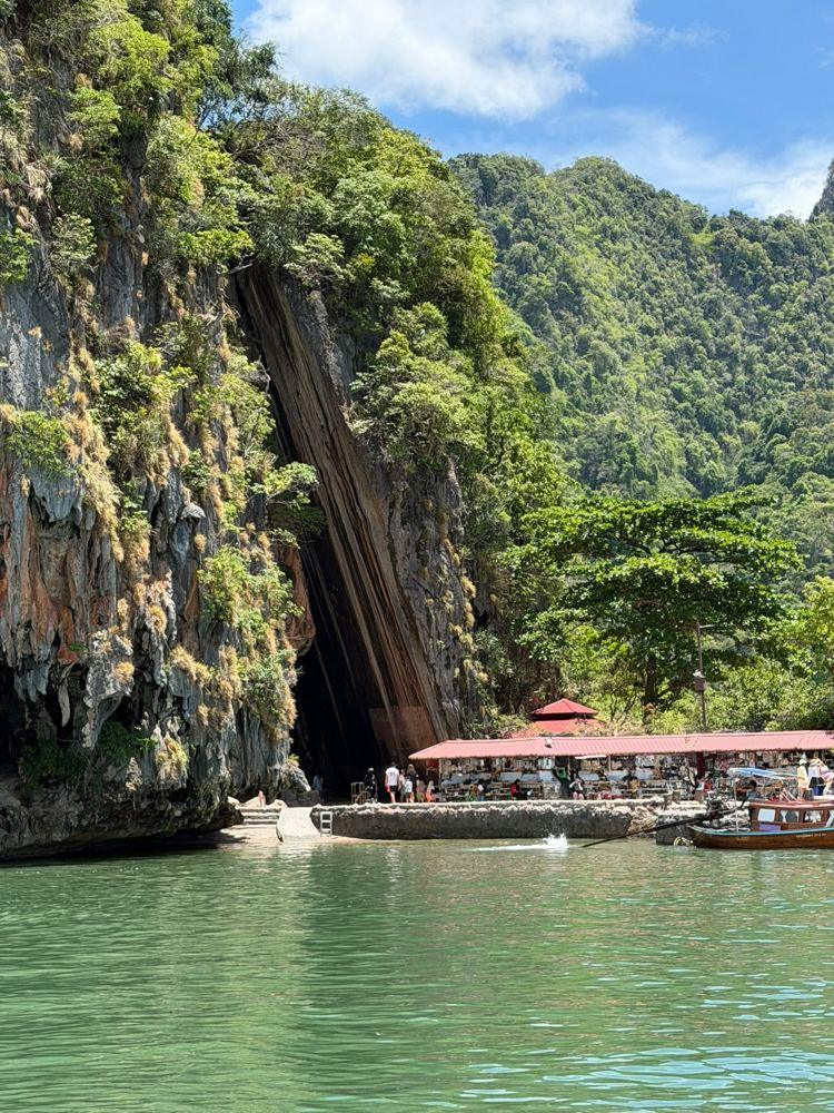 Limestone cliffs and emerald water in Phang Nga Bay